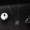 Halloween new hip hop men and women with the same skeleton hand alloy punk style necklace