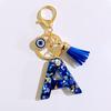 1 Stück Buchstaben-Charms-Anhänger mit Strasssteinen und Quaste Blaue Harz Initialen Schlüsselanhänger Stilvolles Geschenk für Frauen