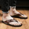 2025 high-end comfortable men's summer wear a pedal on the first layer of cowhide men's flip-flops European station slippers men's trend
