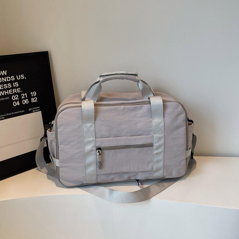 Compact Travel Duffel Bag with Adjustable Shoulder Strap Multiple Pockets Lightweight Weekender Bag
