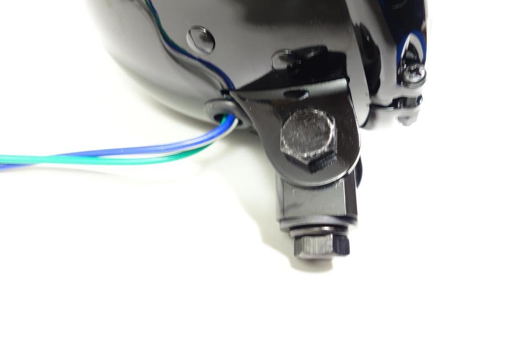 5.5-inch Bates-style headlight, black body, H4 bulb, custom headlight with clear lens.