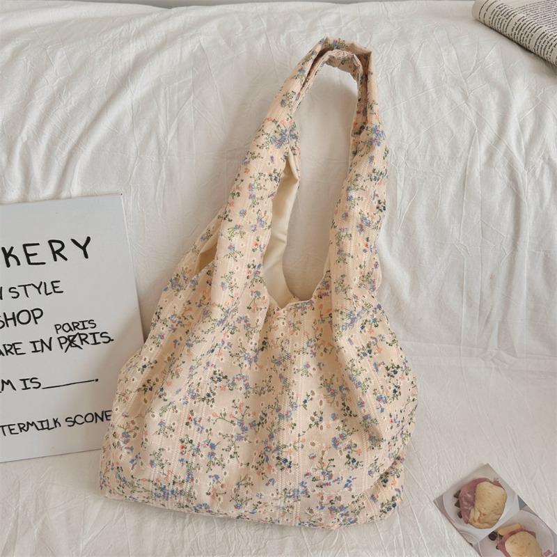 Korean Niche Hollow Broken Flower Canvas Bag Women's New Largecapacity Commuter Underarm Bag Shoulder Bag