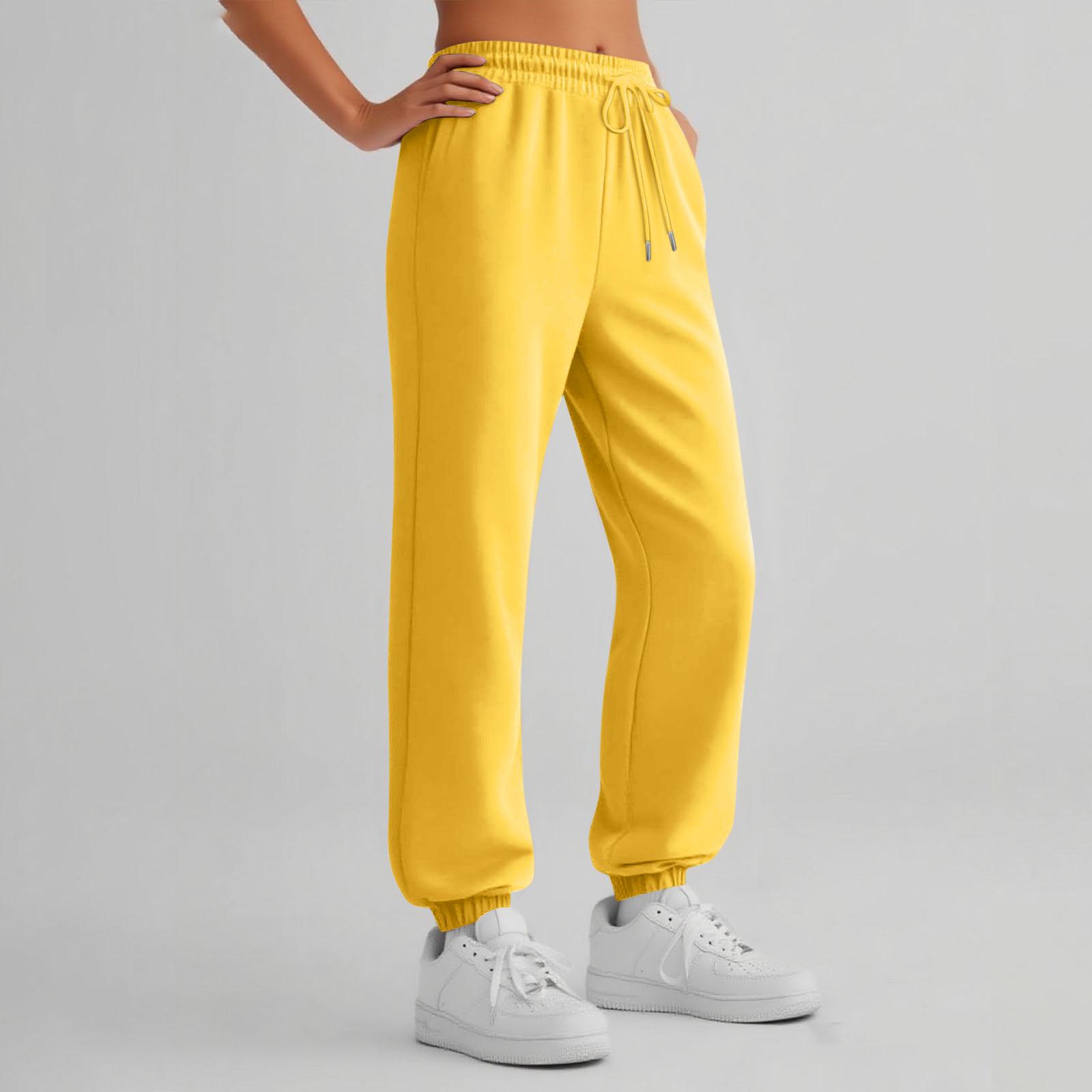 

Женские спортивные штаны с карманами однотонные L жёлтый