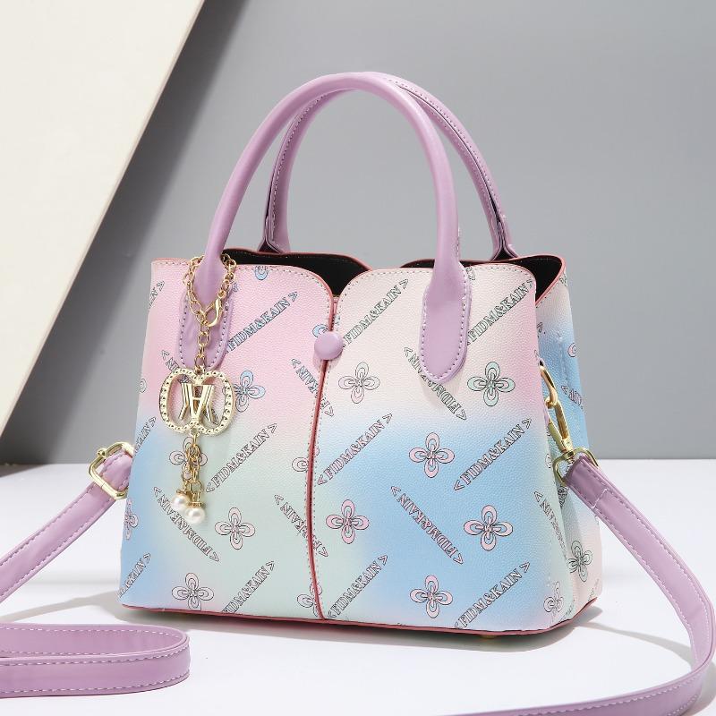New high-end spring and summer printing color large-capacity letter bag niche light luxury fashion versatile shoulder bag