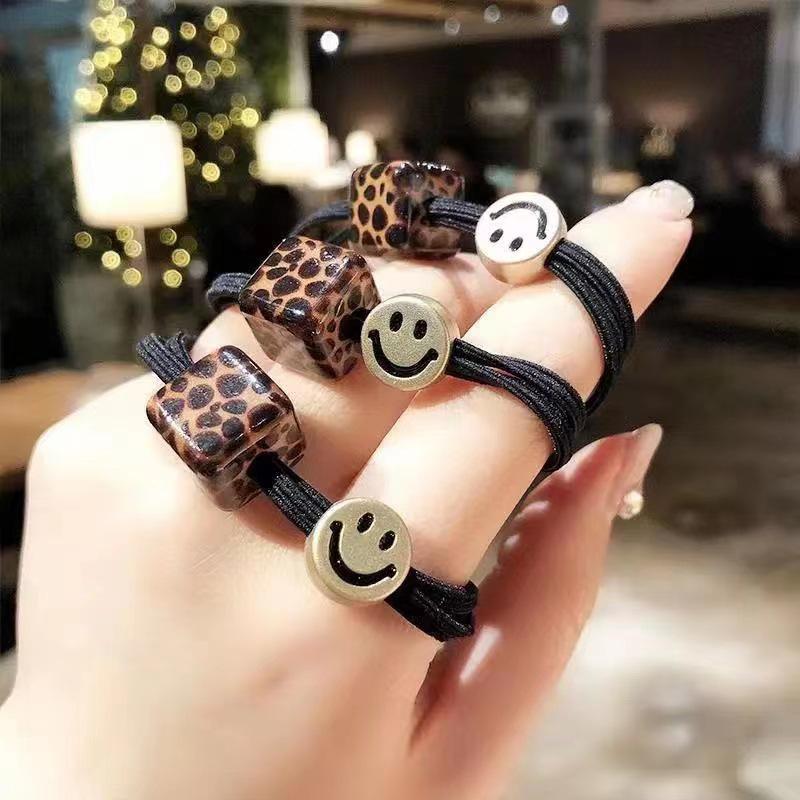 

Leopard Print Smiley Face Hair Tie – High Elasticity Fashionable Ponytail Band