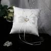 1 pieza de Almohada para Anillos de Boda Cuadrada Blanca Simple de Estilo Europeo con un Lazo de Doble Corazón, Adecuada para Colgar Anillos.
