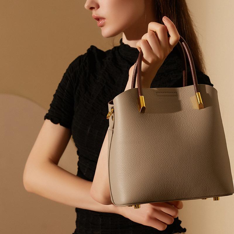 Spring and summer niche leather bucket bag women's versatile handbag high-end casual messenger bag cowhide bag