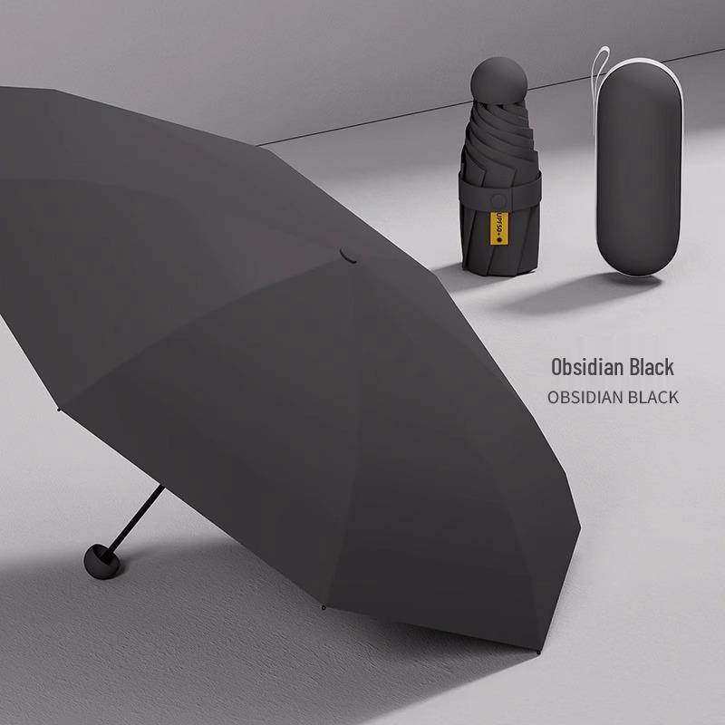 "Portable Capsule Umbrella: Compact, High-End Sunshade & Rain Protection"