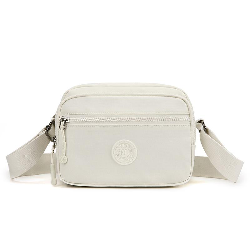 

Маленька сумка Жіноча сумка на плече Легка сумка кросбоді Сумка для мами бежевий