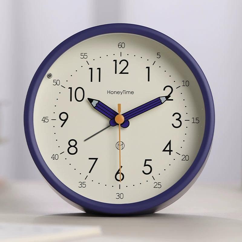 

Simple and quiet small alarm clock, specially designed for students to get up and place on the bedside table фіолетовий