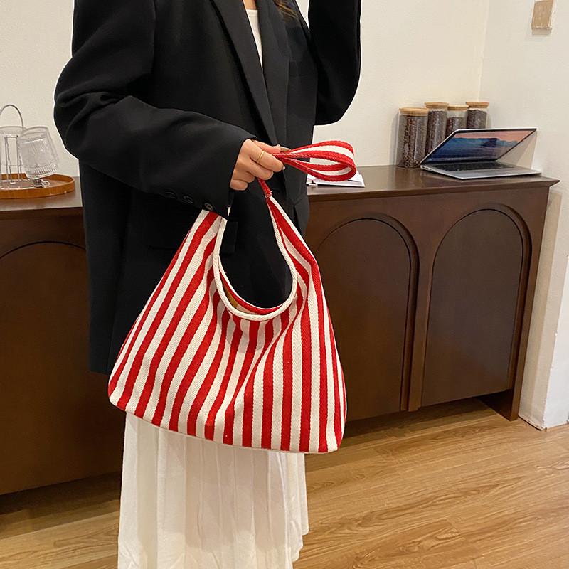 Trendy Retro Artistic Handbag Featuring Spacious Interior And Soft Knit Fabric For Fashion Lovers