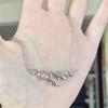 Elegant Hollow Water Wave Pendant Necklace with Spiral Spring Design - Light Luxury Clavicle Chain