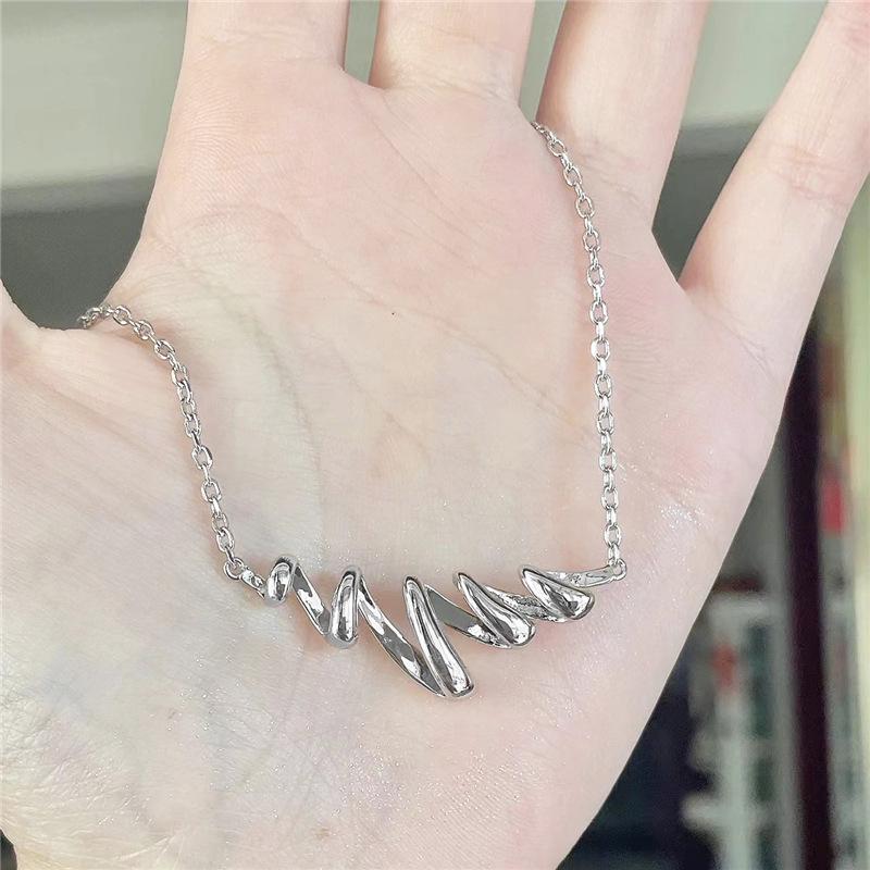 Elegant Hollow Water Wave Pendant Necklace with Spiral Spring Design - Light Luxury Clavicle Chain