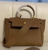 2026 nova bolsa de couro togo com alça larga para ombro, bolsa de mão de couro bovino de primeira camada, bolsa feminina original para ombro único e transversal