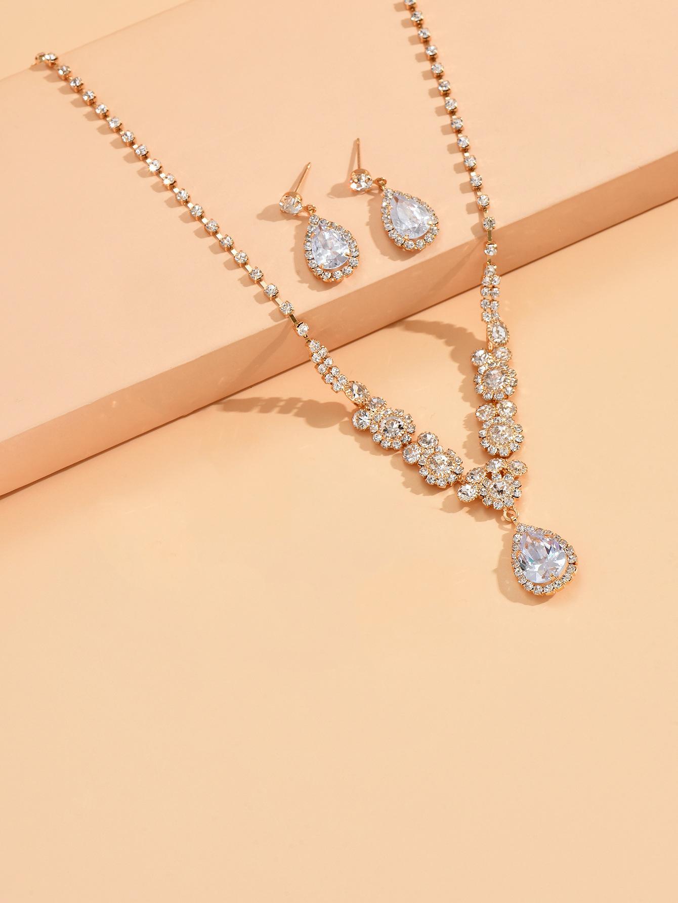 

Комплект свадебных украшений для невесты из трех ярких стразов, цирконов, ожерелья и серег в форме слезы ангела, браслета.