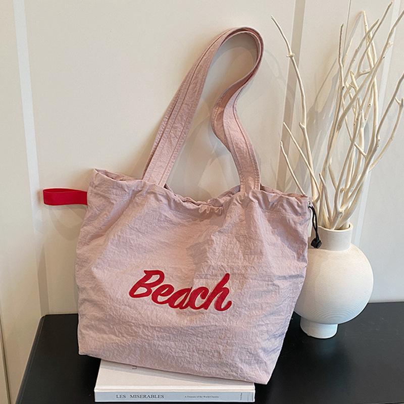 Rope waterproof single shoulder portable convenient 100 new bags tote bags large-capacity casual printing draws розовый 1798₽