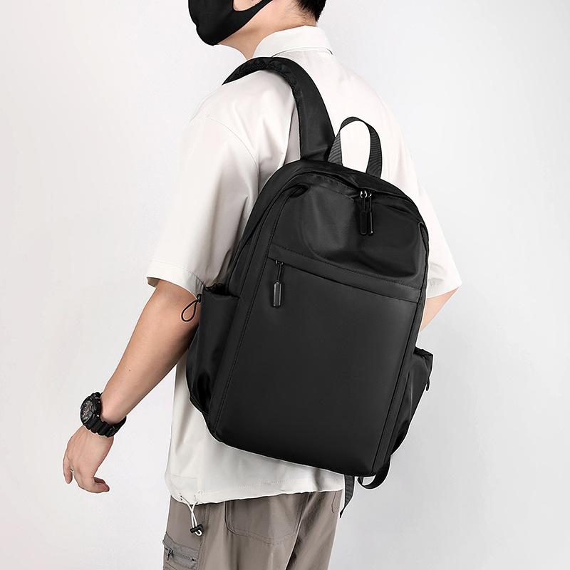 Schoolbag wholesale trend new simple backpack fashion solid color men's backpack junior high school student bag