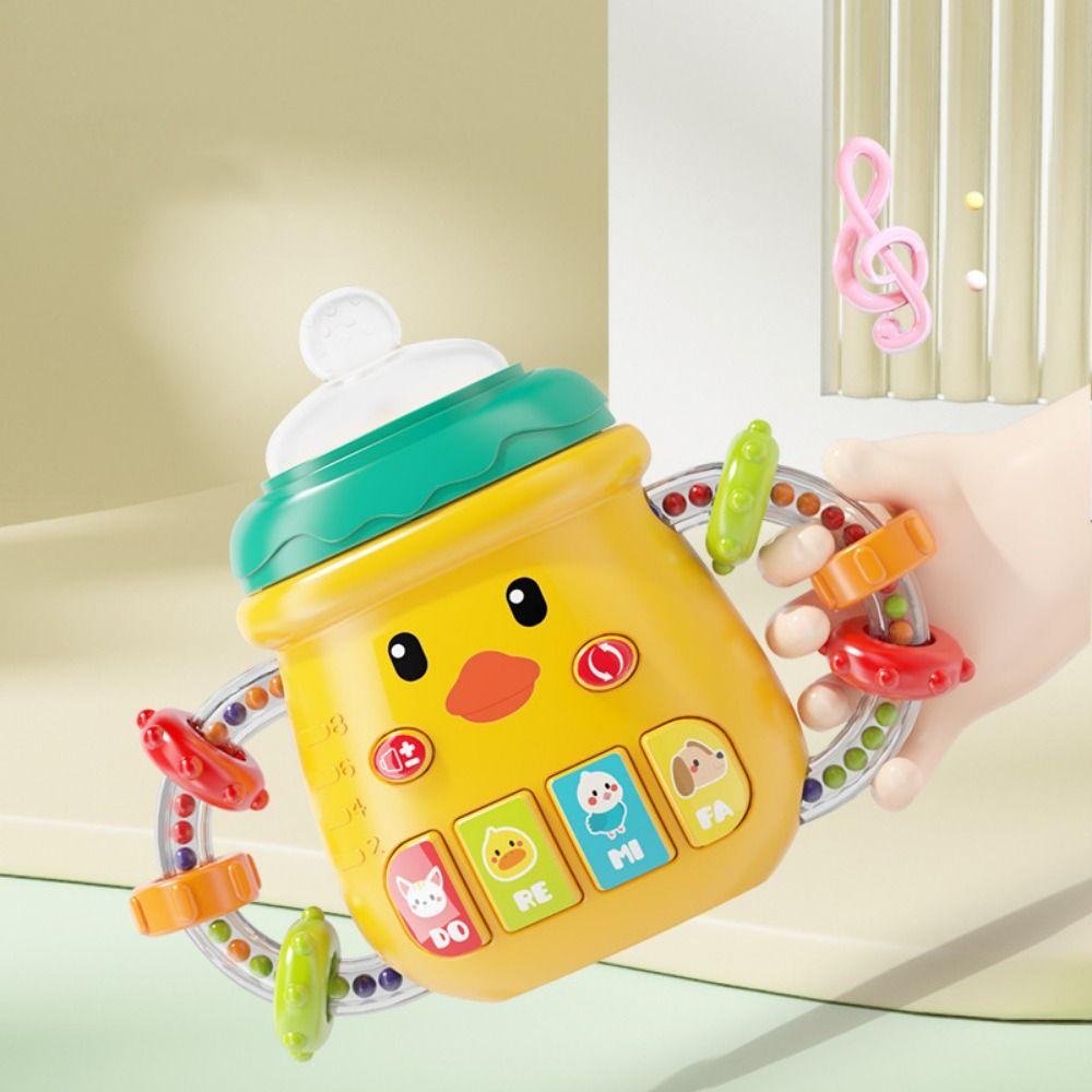 

Teether Rattles Baby Bottle Toy Soft Electric Comfort Bottle Newborn Gift рожевий