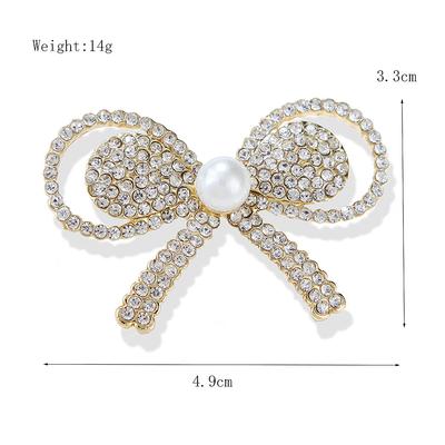 Modische Glänzende Schleife Perlen Brosche Legierung Pins Damen Bekleidung Zubehör Exquisiter Ethnischer Stil Hypoallergen Luxus Emaille Brosche Langlebige Farbe