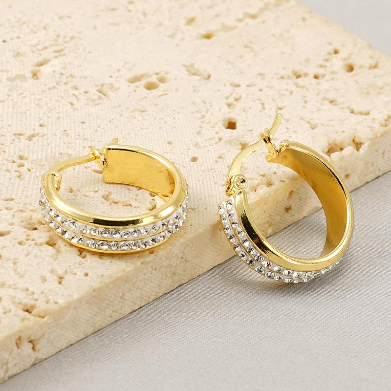 New titanium steel fashionable round diamond earrings niche design high sense elegant temperament earrings women