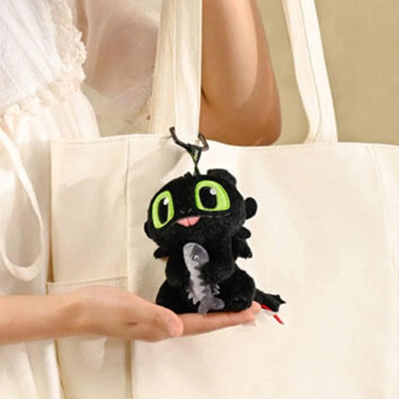 Real Universal Studios Dragon Taming Toothless Doll Plush Holding Fish Doll School Bag Doll Cute Gift