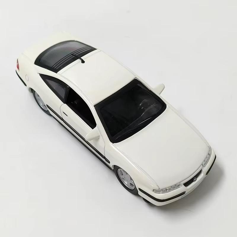 Vrac Sans boîte 1:Modèle de Voiture en Alliage Opel Calibra 1995 Échelle 43 Collection Statique Jouets de Fête Décorés Cadeau Souvenir