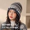 Sweet and cool color matching jacquard ear cap, colored ball twist braid wool hat modified face shape autumn and winter knitted hat women