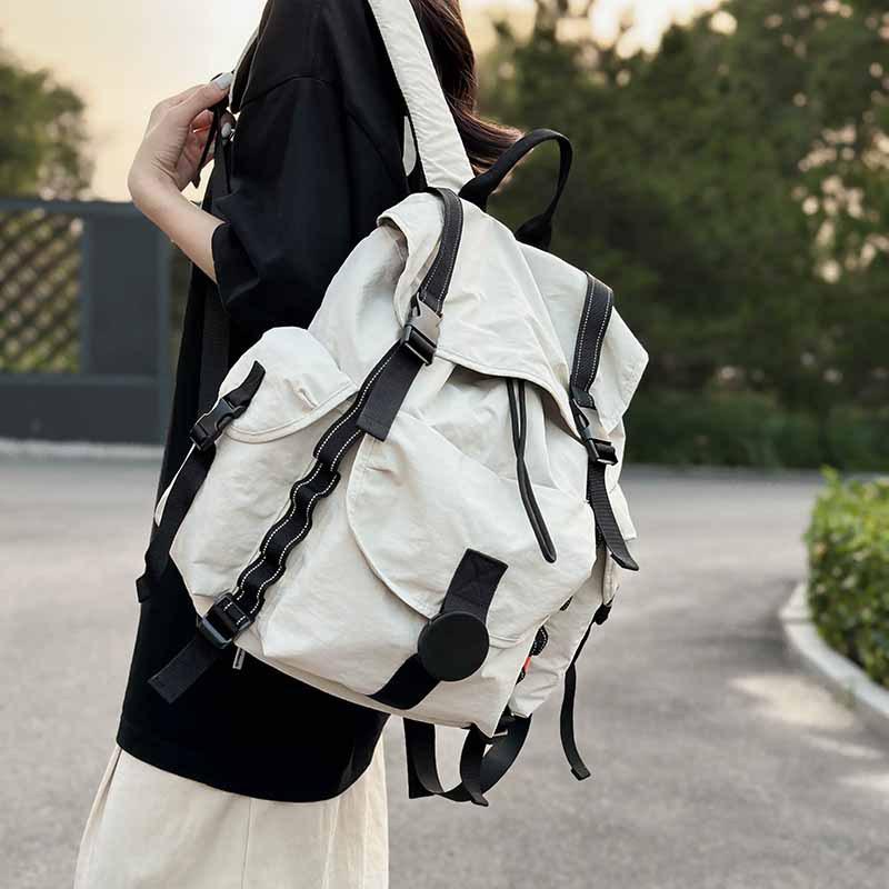 New outdoor large-capacity waterproof and lightweight backpack women's travel mountaineering computer backpack male student schoolbag