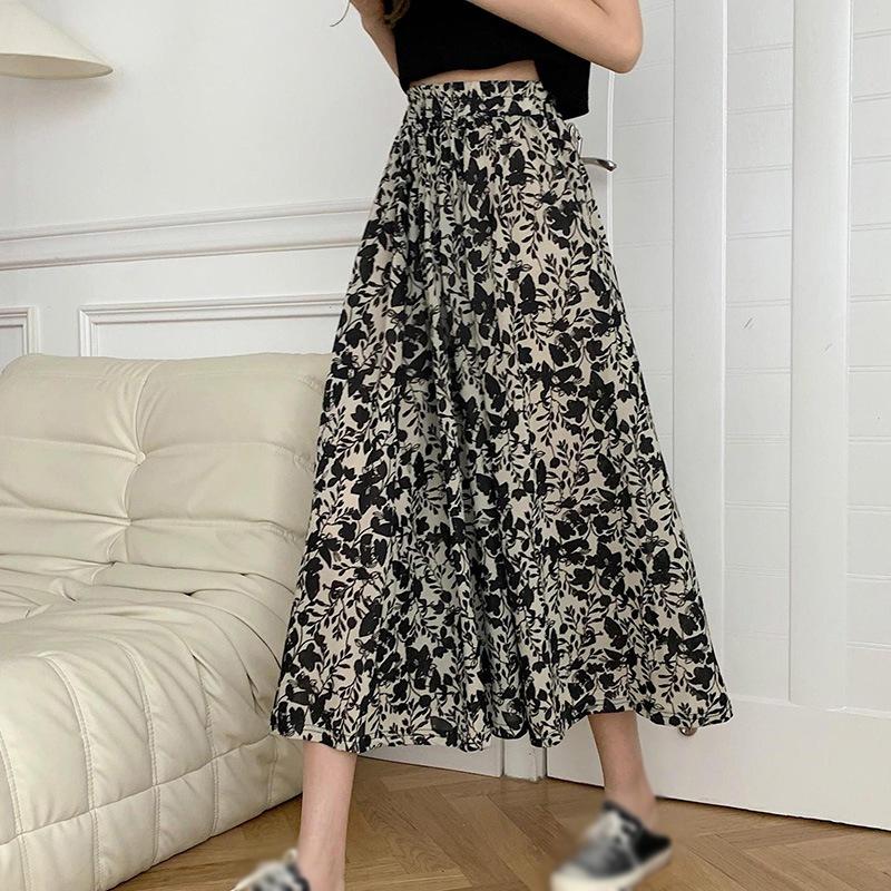 

Женская шифоновая юбка-миди с высокой талией и цветочным принтом для отдыха M