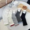 Female Spring and Autumn Tide Solid Color Movement In The Tube Pile Socks