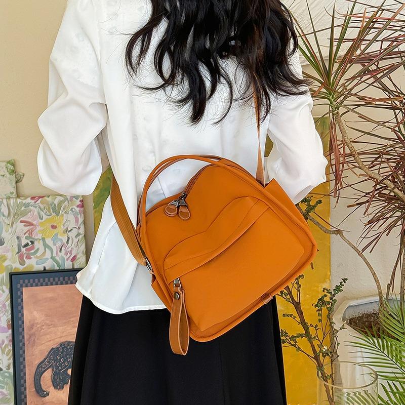 New lightweight casual bag shoulder bag women's hand-held nylon bag fashionable versatile commuter messenger bag