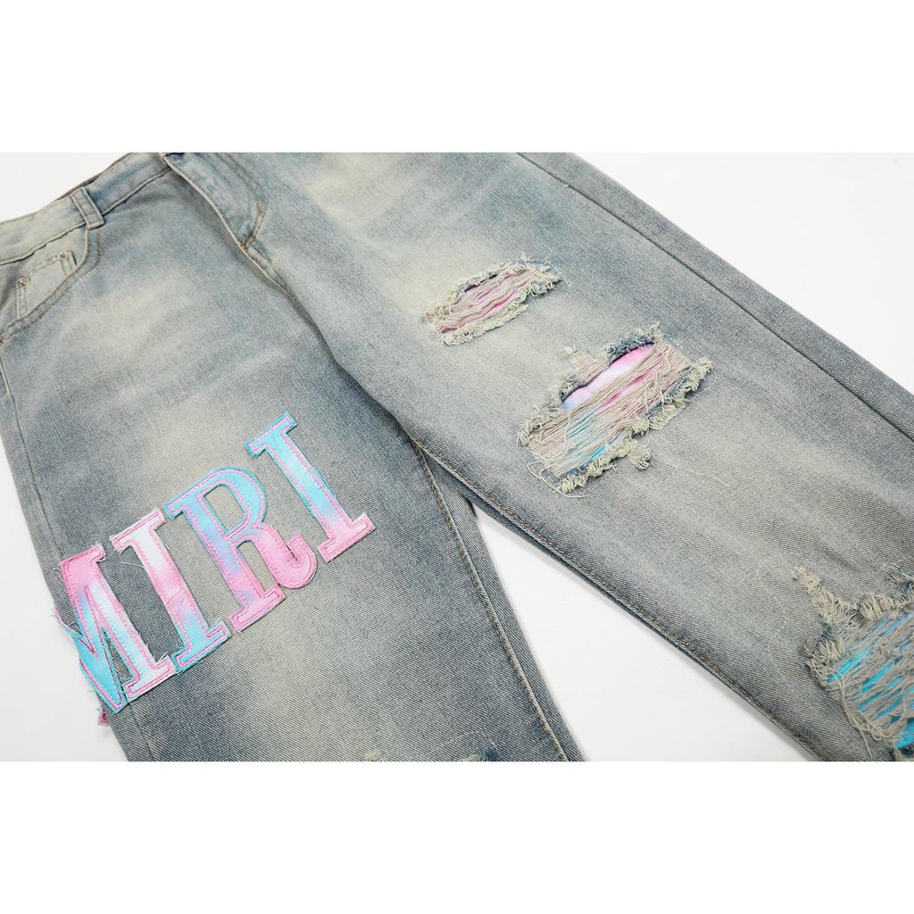 M33 Amiri Trendy Jeans im amerikanischen Stil für Herren und Damen mit Stoffpatches, Löchern, Stickereien, lässige und modische High Street-Hosen