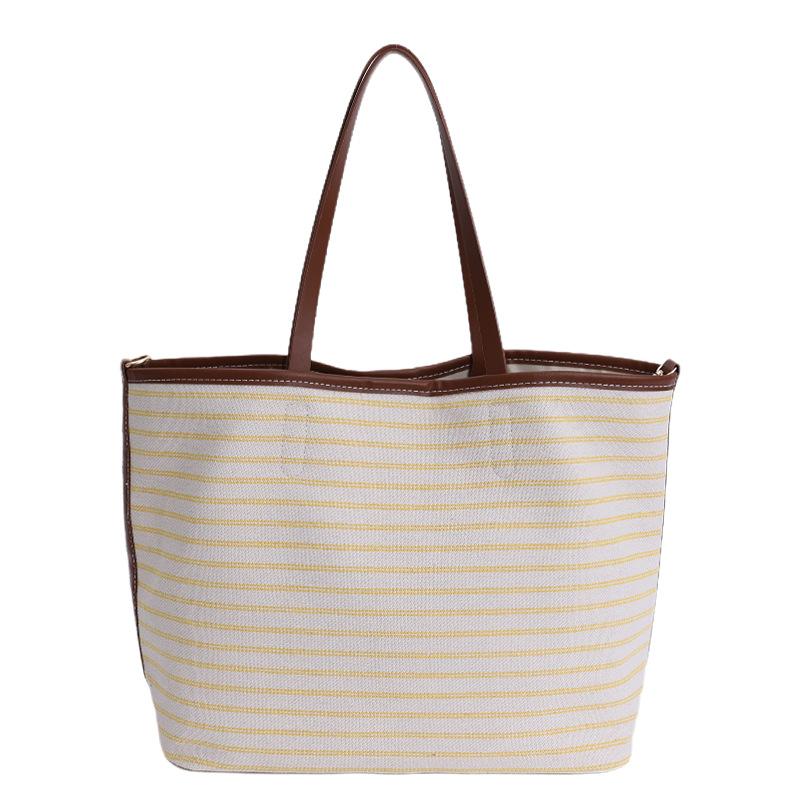 New niche large-capacity striped tote bag, premium lazy fashion commuter versatile canvas bag