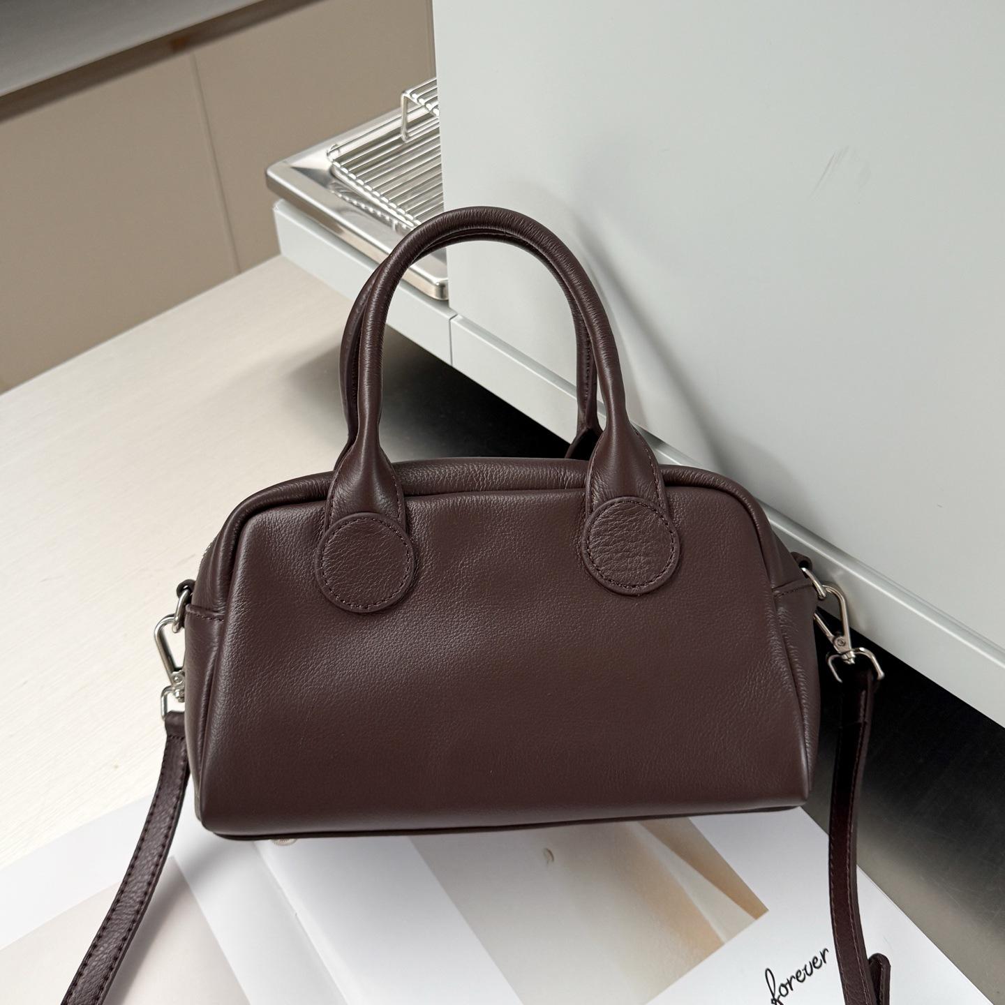 

Сумка-ведро из натуральной коровьей кожи для женщин Новый трансграничный стиль Модная трендовая ручная сумка на одно плечо из мягкой кожи 25x15x12cm кофейный