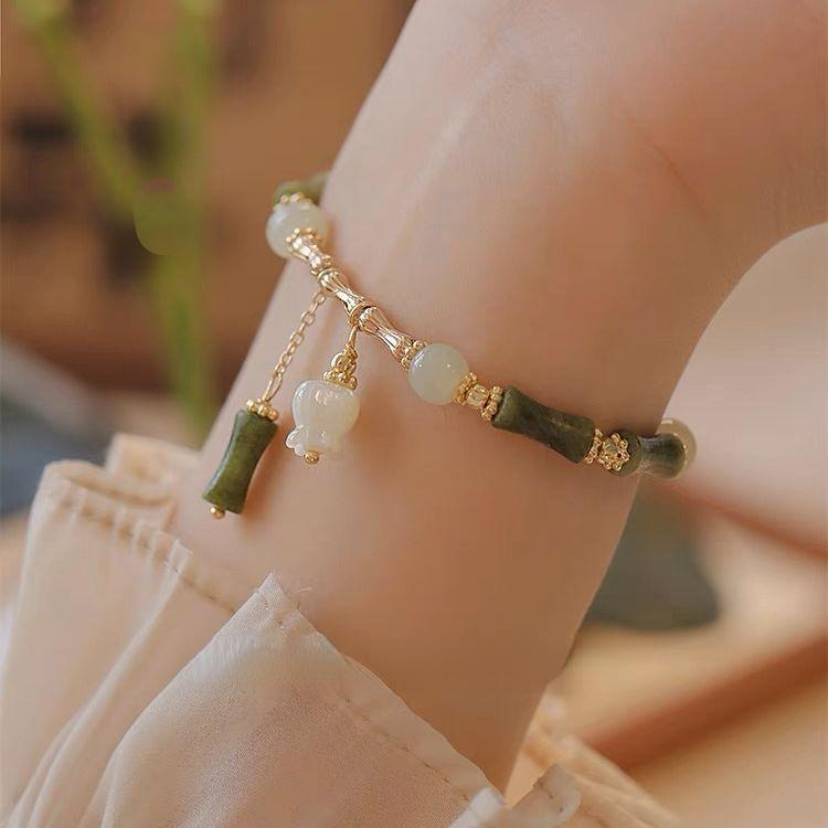 Bambusglocken-Orchideen-Armband, Damenmode-Design, fortschrittlicher Sinn für Mode, leichter Luxus, antiker Stil, Accessoires-Armband