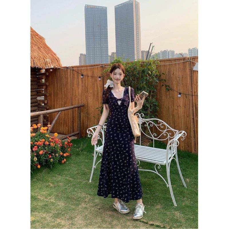 French V-neck floral dress for women's 2026 summer Korean version of pure desire temperament, waist and thin medium and long skirt
