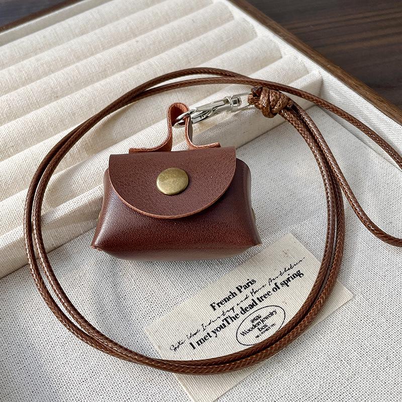 

Магнитный держатель для очков на шею: Многофункциональная сумка из искусственной кожи для хранения вещей и головных уборов.