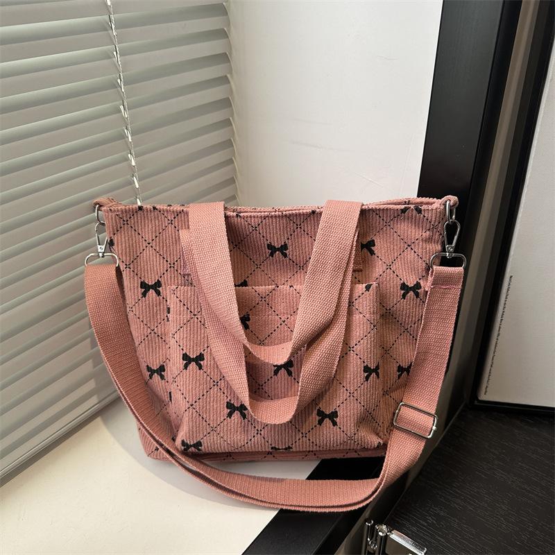 Sommer neue einfache und modische tragbare Tragetasche beliebte Mode Retro Pendler Schulter Umhängetasche