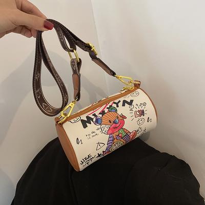 Little Bear's Graffiti Round Tube Bag with A Fashionable Wide Strap for Single Shoulder Carrying.