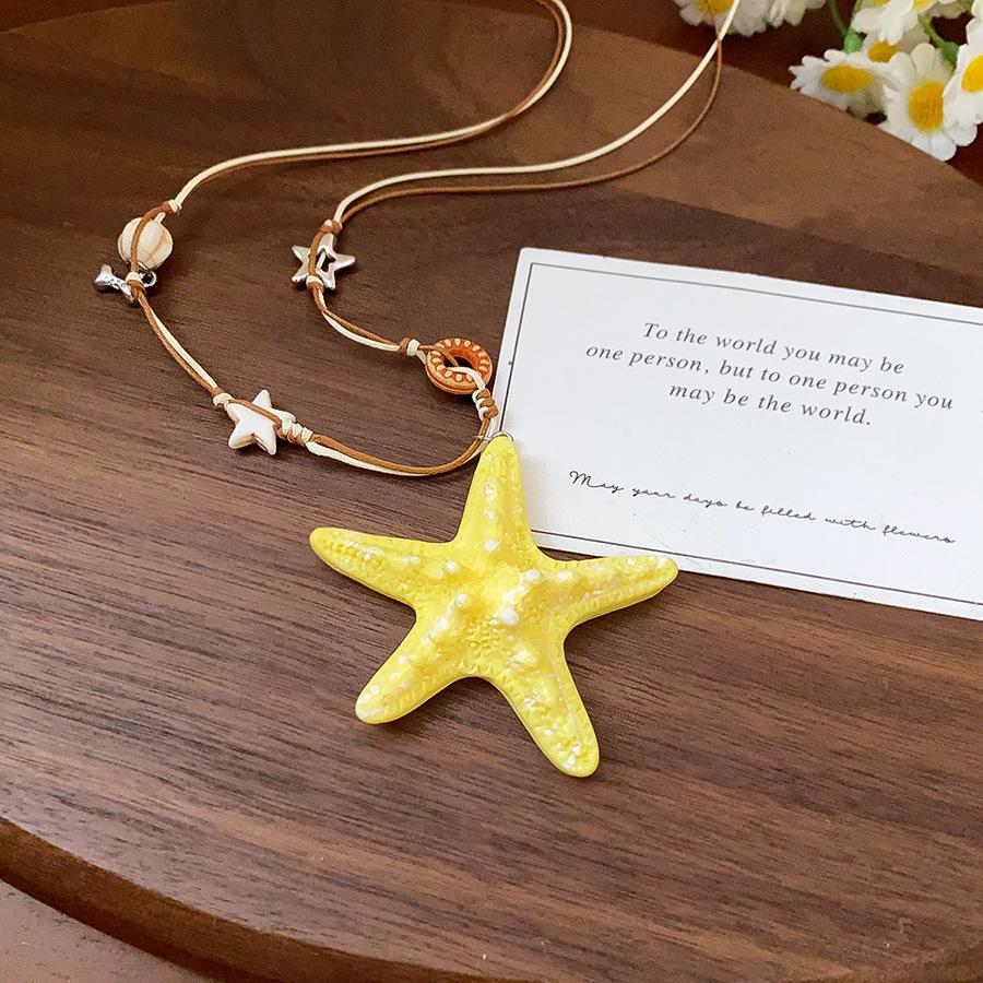 Retro Ethnic Heart Necklace: Wooden Flower Pendant Sweater Chain for Women