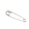 A Large Silvery Metal Hairpin, Suitable For Hairpin, Scarves, And Shawls As A Versatile Decorative Pin.