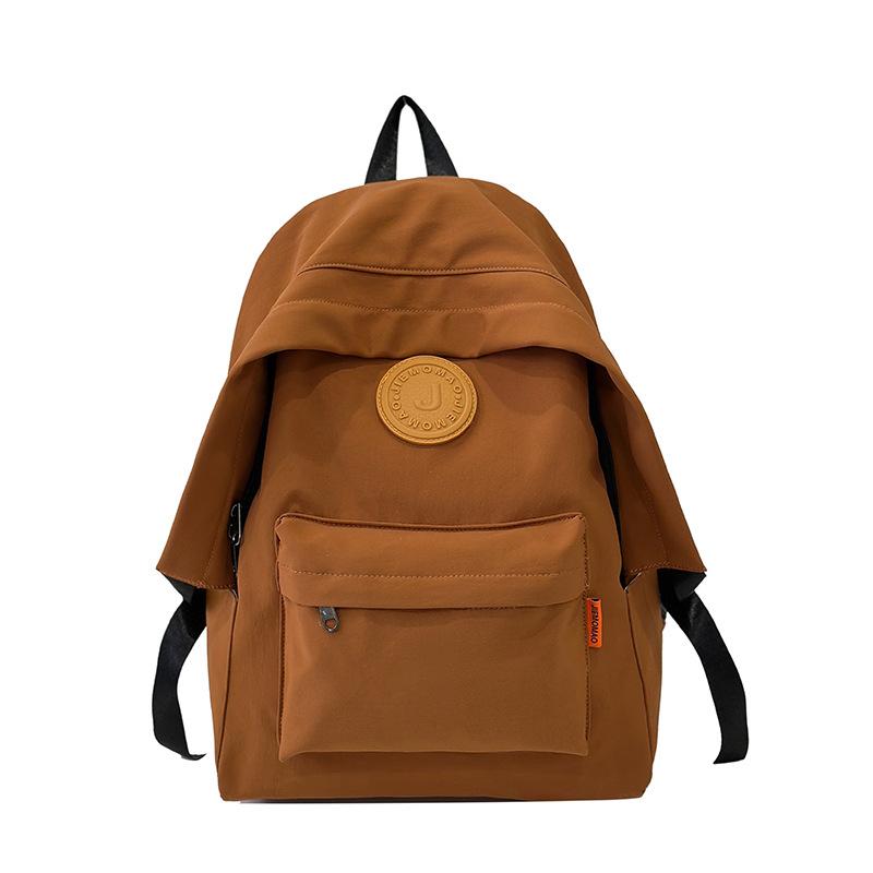 Stylish simple large-capacity couple student schoolbag new junior high school high school student backpack fashion