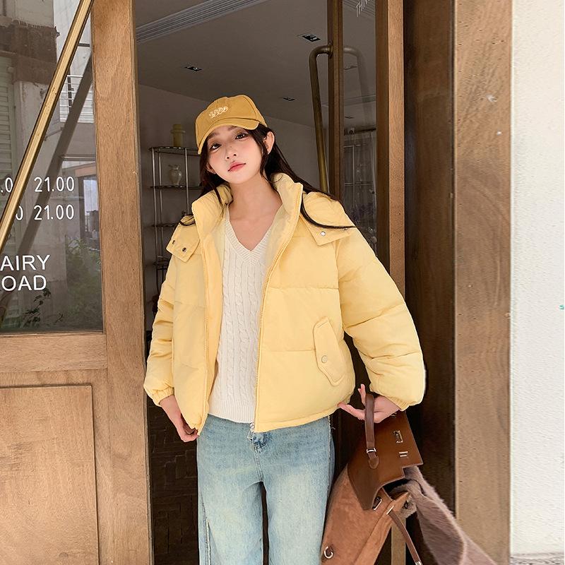 Autumn and Winter New Thick Corduroy Cotton-padded Jacket Loose Ladies Short Hooded Cotton-padded Jacket.