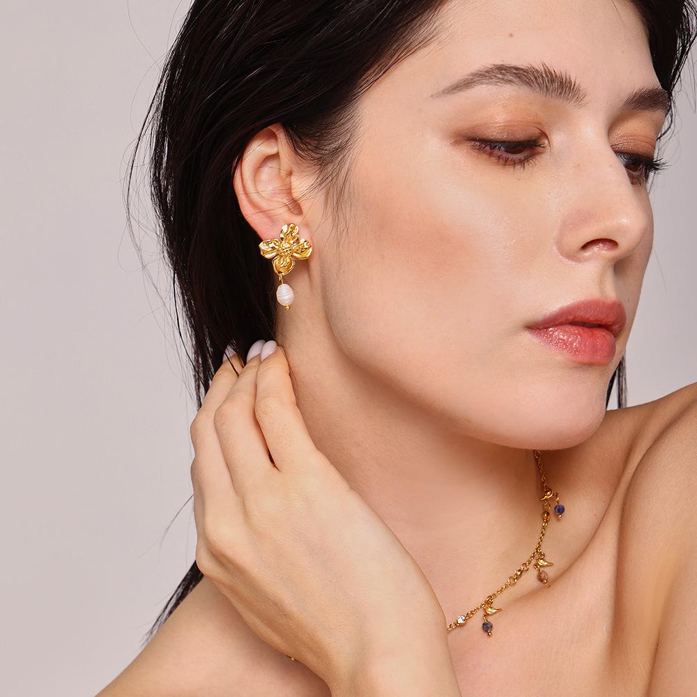 Qiong Yao Petal Tassel Freshwater Pearl Earrings - European & American Style Luxury Titanium Steel Floral Studs.