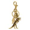 COACH Rexy Skelett Taschenanhänger Gold - Metall Schlüsselanhänger & Schlüsselring - Designer Accessoire