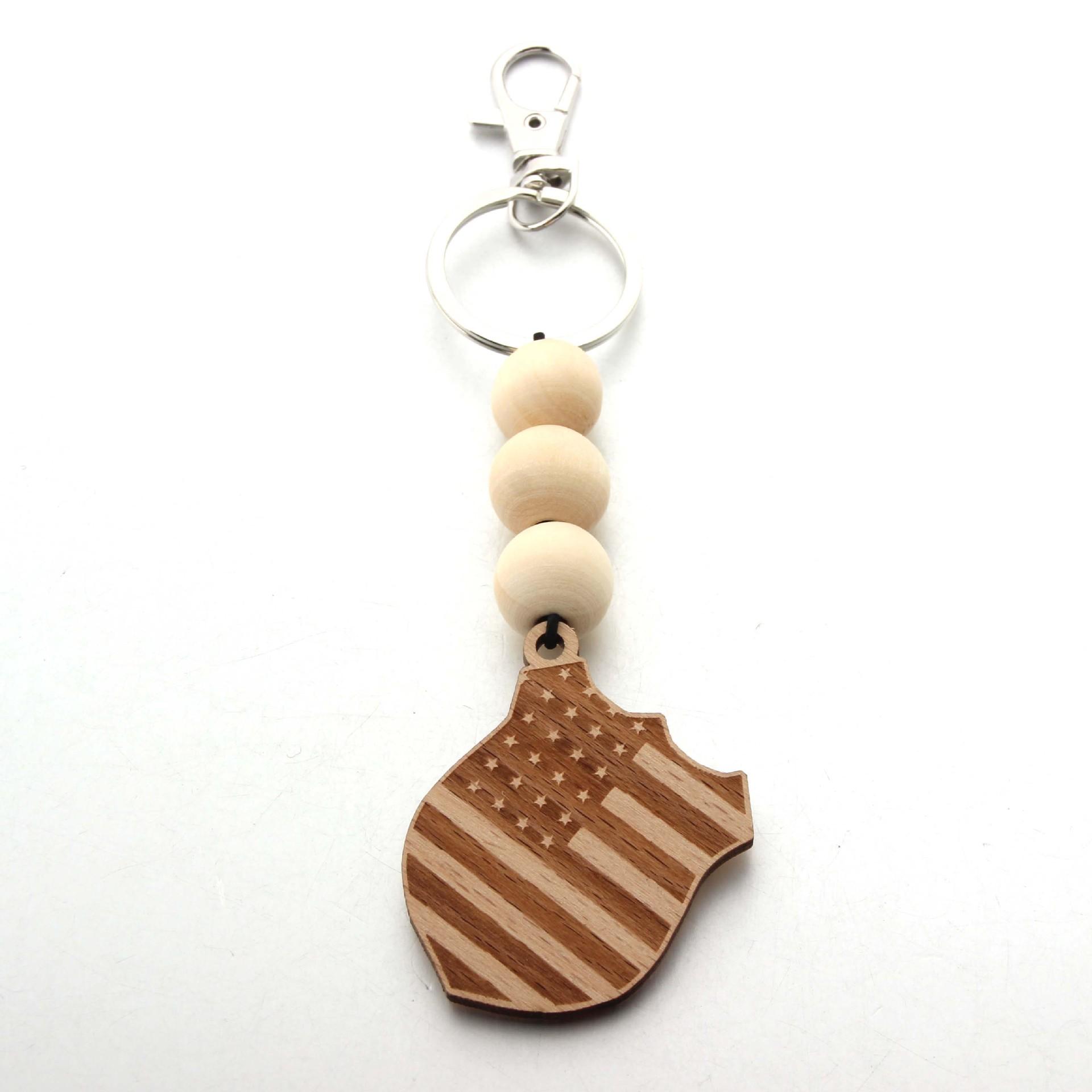 

Woven Silicone Ball Bead American Flag Board Men s keychain Wooden Letter Round Pendant Bag Accessories