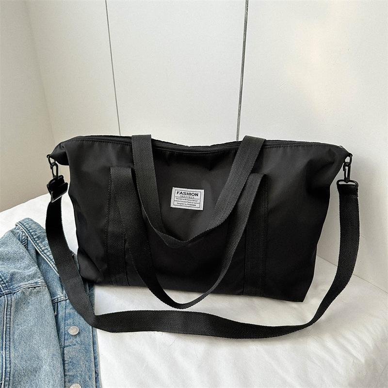 

2024 зима новый темперамент модный дизайн одно плечо через плечо большой емкости иностранный стиль однотонный простой дорожный плечевой мешок чёрный