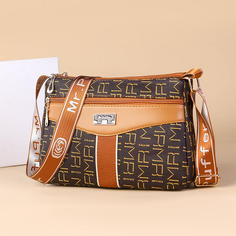 Middle-aged and Elderly Mother Buying A Large-capacity Multi-functional Shoulder Crossbody Bag In Spring