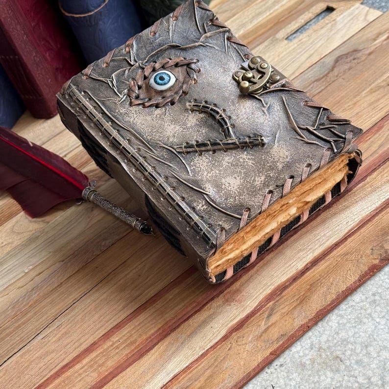 Handmade Leather Spellbook Journal - 7x5 Inch Fantasy Notebook with Eye Design, , Gothic Horror Grimoire, Evil Eye, Halloween