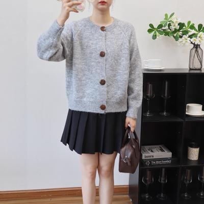 Herbst und Winter neue Rundhals lockere lässige Strickjacke Design Knopf Pullover Jacke Damen